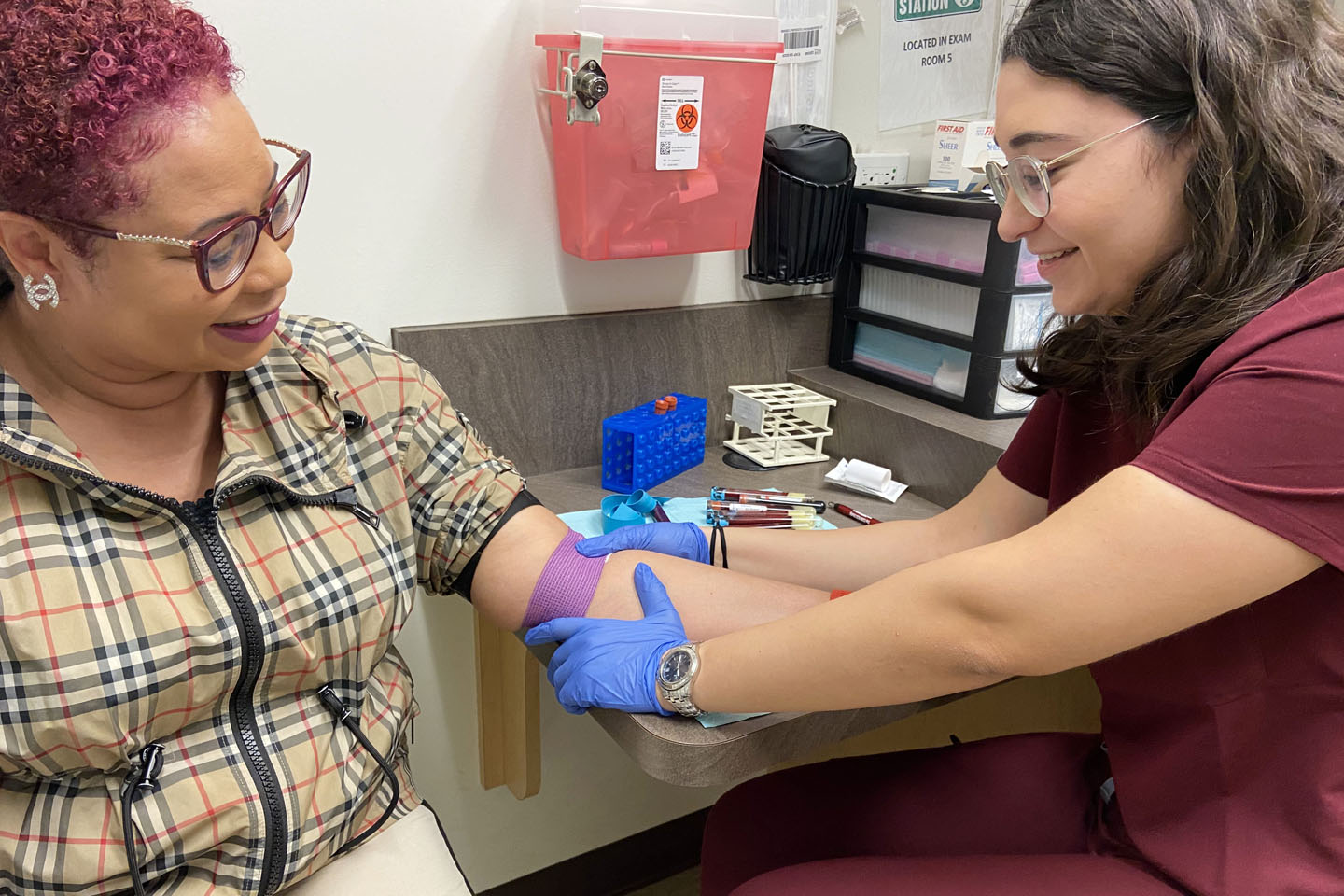 nurse drawing a patient's blood