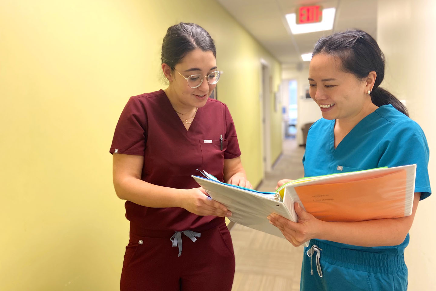 patient and nurse in the hallway